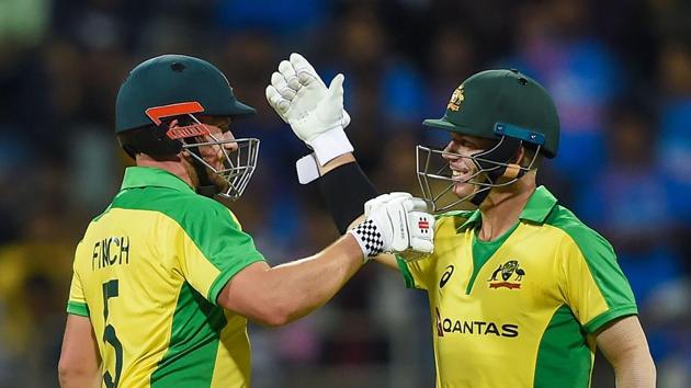 Australian batsmen Aaron Finch and David Warner after completing their centuries.(PTI) Australian batsmen Aaron Finch and David Warner after completing their centuries.(PTI)