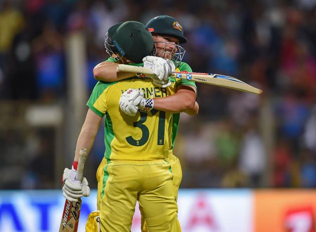 Australian batsman David Warner and batting partner Aaron Finch celebrate the win. (PTI) Australian batsman David Warner and batting partner Aaron Finch celebrate the win. (PTI)
