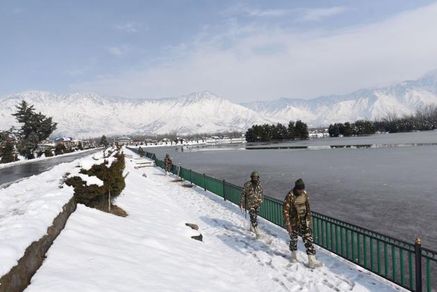Paramilitary personnel walk in snow near the Dal Lake in Srinagar, Jammu and Kashmir, India on Tuesday, January 14, 2020. (Photo: Waseem Andrabi / Hindustan Times for representation) Paramilitary personnel walk in snow near the Dal Lake in Srinagar, Jammu and Kashmir, India on Tuesday, January 14, 2020. (Photo: Waseem Andrabi / Hindustan Times for representation)