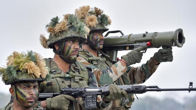 Soldiers during a dress rehearsal ahead of Army Day celebrations, at Delhi Cantt. in New Delhi.(PTI Photo)