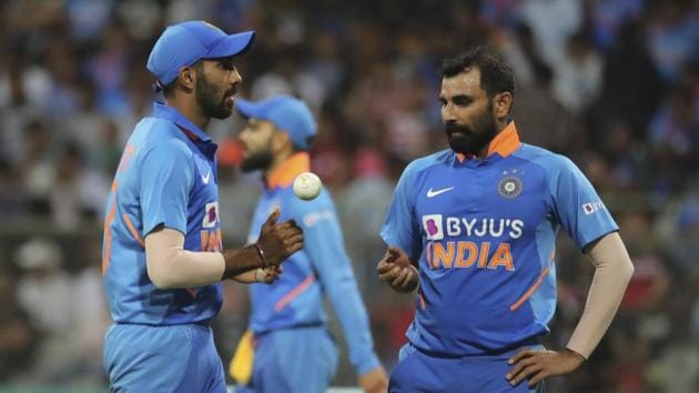 India's Jasprit Bumrah, left, chats with Mohammed Shami(AP)