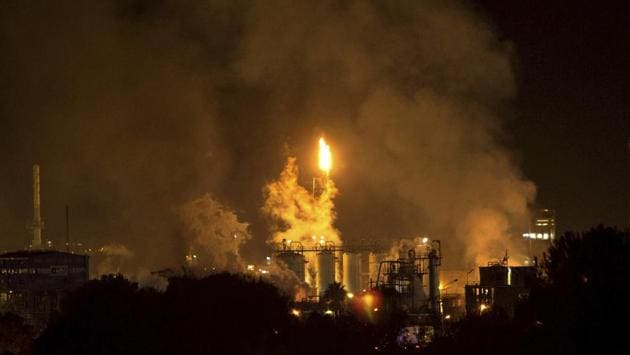 Smoke rises following a big explosion at an industrial hub near the port city of Tarragona, Spain. An explosion ripped through the facility, triggering a massive blaze which raged through the night. Rescuers found two bodies at a chemical plant in northeastern Spain on Wednesday. (David Oliete / AP) Smoke rises following a big explosion at an industrial hub near the port city of Tarragona, Spain. An explosion ripped through the facility, triggering a massive blaze which raged through the night. Rescuers found two bodies at a chemical plant in northeastern Spain on Wednesday. (David Oliete / AP)