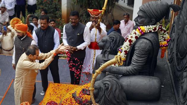 Shiv Sena Chief Uddhav Thackeray pays tribute to the statue of Chhatrapati Shivaji Maharaj during his visit to Thane Municipal Corporation, in Thane.(PTI)