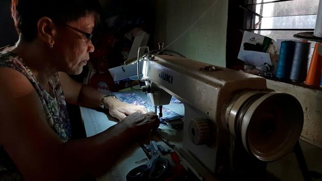 A seamstress sews protective masks to be donated to residents affected by the erupting Volcano in Lipa. Although Taal is one of the world’s smallest active volcanoes at only 311 meters (1,020 feet) high, it can be deadly. One eruption killed more than 1,300 people in 1911. (Adrian Portugal / REUTERS) A seamstress sews protective masks to be donated to residents affected by the erupting Volcano in Lipa. Although Taal is one of the world’s smallest active volcanoes at only 311 meters (1,020 feet) high, it can be deadly. One eruption killed more than 1,300 people in 1911. (Adrian Portugal / REUTERS)