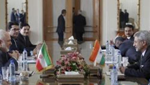 Iranian Foreign Minister Mohammad Javad Zarif, second left, speaks with Indian Foreign Minister Subrahmanyam Jaishankar, second right, during their meeting in Tehran in 2019.(AP)