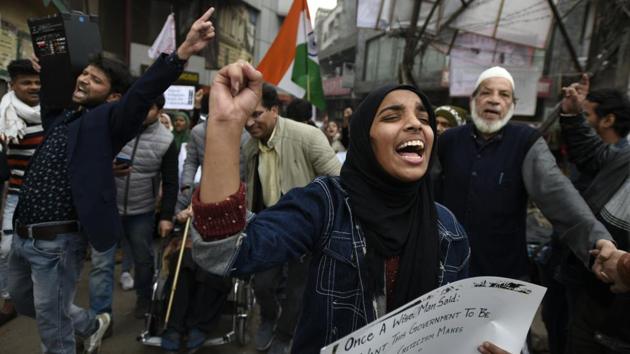 People hold placards during a procession at Shaheen Bagh. Nida Parvez, a Class 12 student, said she was unable to prepare for her board examination because of the demonstration, but fully backed it. “I do not come here everyday but whenever I switch on the television, I see news of some violent crackdown. Our dinner conversations have moved towards this.” (Burhaan Kinu / HT Photo) People hold placards during a procession at Shaheen Bagh. Nida Parvez, a Class 12 student, said she was unable to prepare for her board examination because of the demonstration, but fully backed it. “I do not come here everyday but whenever I switch on the television, I see news of some violent crackdown. Our dinner conversations have moved towards this.” (Burhaan Kinu / HT Photo)