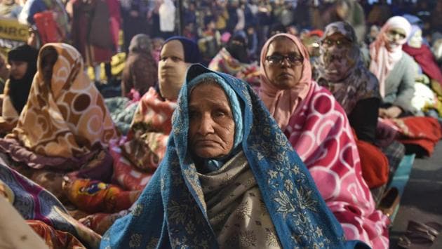 Women protesters along with their children participate in a sit-in against National Register of Citizens (NRC) and CAA at Shaheen Bagh. With thousands of people at the site each night, food and water requirements have been resolved by an army of volunteers, who distribute and coordinate supplies and insist that everything is crowd-sourced. Every two hours, announcements blare from microphone that cash donations are banned. (Burhaan Kinu / HT Photo) Women protesters along with their children participate in a sit-in against National Register of Citizens (NRC) and CAA at Shaheen Bagh. With thousands of people at the site each night, food and water requirements have been resolved by an army of volunteers, who distribute and coordinate supplies and insist that everything is crowd-sourced. Every two hours, announcements blare from microphone that cash donations are banned. (Burhaan Kinu / HT Photo)