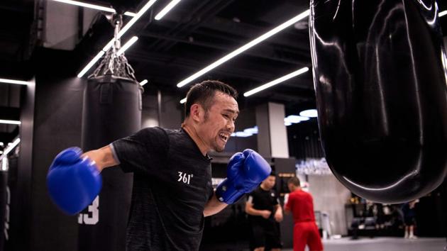 But what he lacks in talent Zhang makes up for in hand speed, heart and a desire to make his family and supportive girlfriend proud. “What we have to prove is my spirit, my willpower, and that while I may be lacking technically, I will improve,” said Zhang, whose goal is to become an Asian champion. (Noel Celis / AFP) But what he lacks in talent Zhang makes up for in hand speed, heart and a desire to make his family and supportive girlfriend proud. “What we have to prove is my spirit, my willpower, and that while I may be lacking technically, I will improve,” said Zhang, whose goal is to become an Asian champion. (Noel Celis / AFP)