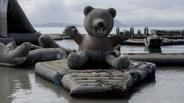 Inflatables floating on Taal Lake are seen covered with volcanic ash. Phivolcs said volcanic activity had “generally waned to weak emission of steam-laden plumes”. Even so, it had recorded more than 100 tremors since Wednesday, meaning magma was still rising. (Eloisa Lopez / REUTERS) Inflatables floating on Taal Lake are seen covered with volcanic ash. Phivolcs said volcanic activity had “generally waned to weak emission of steam-laden plumes”. Even so, it had recorded more than 100 tremors since Wednesday, meaning magma was still rising. (Eloisa Lopez / REUTERS)