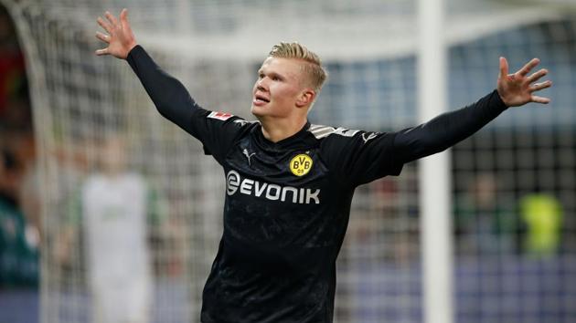Borussia Dortmund's Erling Braut Haaland celebrates scoring their fifth goal to complete his hat-trick. (REUTERS) Borussia Dortmund's Erling Braut Haaland celebrates scoring their fifth goal to complete his hat-trick. (REUTERS)