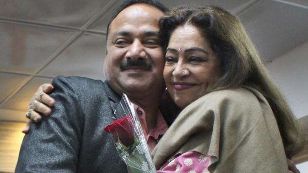 MP Kirron Kher greeting new Chandigarh BJP president Arun Sood at the party office on Friday.