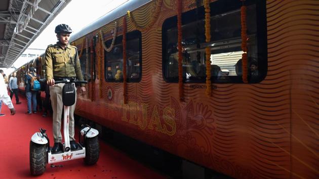 A Railway Protection Force (RPF) official rides a segway at the Ahmedabad Kalupur station. The train, which will run on all days of the week except Thursday, has the capacity to carry 736 passengers. (Sam Panthaky/AFP)