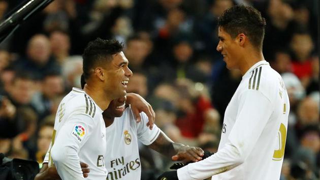 Real Madrid's Casemiro celebrates scoring their second goal with teammates. (REUTERS) Real Madrid's Casemiro celebrates scoring their second goal with teammates. (REUTERS)