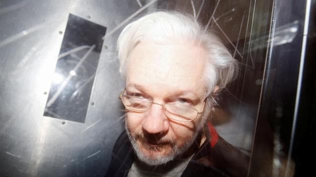 WikiLeaks’ founder Julian Assange leaves Westminster Magistrates Court in London, Britain on January 13. The 48-year-old Australian appeared for a hearing at Westminster Magistrates Court and spoke only to confirm his name and date of birth to the judge and saluted his supporters in the public gallery during the hearing. (Henry Nicholls/REUTERS) WikiLeaks’ founder Julian Assange leaves Westminster Magistrates Court in London, Britain on January 13. The 48-year-old Australian appeared for a hearing at Westminster Magistrates Court and spoke only to confirm his name and date of birth to the judge and saluted his supporters in the public gallery during the hearing. (Henry Nicholls/REUTERS)
