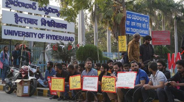 Kashmiri students of the University of Hyderabad staging a protest out the campus on Saturday.(HT Photo)