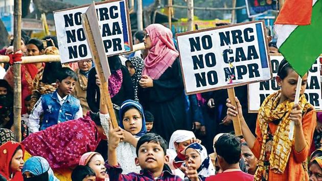 People at a protest against the CAA, NRC and NPR, in Kolkata on Sunday.(ANI)