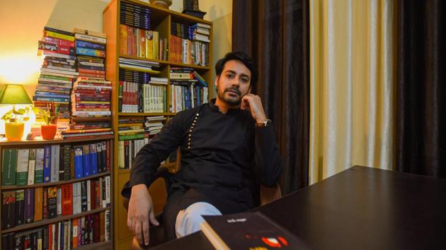 Author Amit Gupta, who writes poetry in Hindi and Bengali,at his residence in Kalkaji, New Delhi.(Amal KS/HT PHOTO)