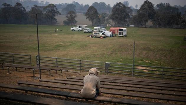 Rod Dunn, the builder, said a friend had kindly offered him use of his property, rent-free for a year. “It’s a good place too,” he said, smiling. “I should know, I built the bloody place.” (Alkis Konstantinidis/REUTERS)