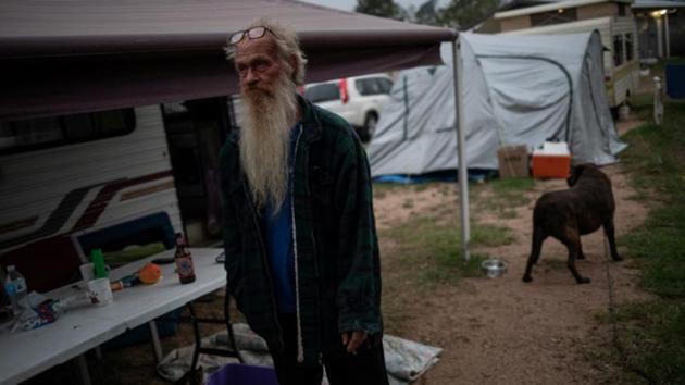 Standing outside a shabby caravan with plastic chairs and dogs roaming around, Dunn recalls how a friend risked his life to rescue him from the blaze, and how strangers from a town 70km away gave him and his wife a tent to sleep in. “That tent saved us,” said the 62-year-old. “I’m totally overwhelmed by what we’ve seen here, the generosity of mankind.” (Alkis Konstantinidis / REUTERS)