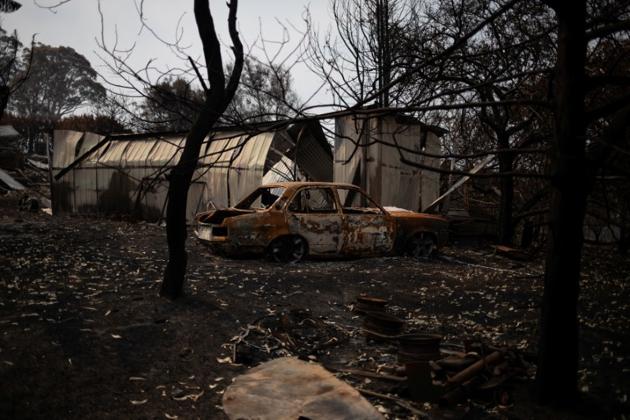 The remains of a car, burnt by a bushfire, stands in front of a destroyed structure. Homes are already becoming available. Peter Hisco is moving to Sydney, Australia’s largest city, and will rent his two-storey house to two displaced families. “My wife has a new job in Sydney so we’ll rent both floors out at a reasonable price.” (Alkis Konstantinidis/REUTERS)