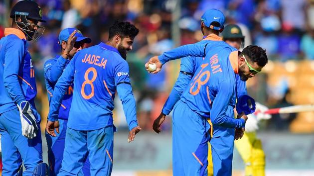 India's Virat Kohli (R) celebrates after taking a catch for the dismissal of Australia's Marnus Labuschagne. (PTI) India's Virat Kohli (R) celebrates after taking a catch for the dismissal of Australia's Marnus Labuschagne. (PTI)