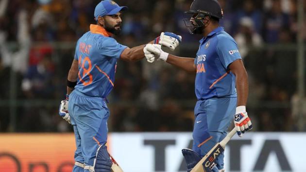 India's Rohit Sharma, right, celebrates with captain Virat Kohli. (AP) India's Rohit Sharma, right, celebrates with captain Virat Kohli. (AP)