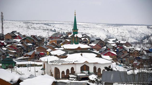 Jammu and Kashmir, Jan 18 (ANI): Snow-covered shrine Chrar-e-Sharif after heavy snowfall in Kanidajan on Saturday. (ANI Photo) Jammu and Kashmir, Jan 18 (ANI): Snow-covered shrine Chrar-e-Sharif after heavy snowfall in Kanidajan on Saturday. (ANI Photo)