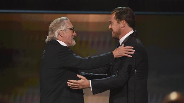Leonardo DiCaprio, right, presents the lifetime achievement award to Robert De Niro at the 26th annual Screen Actors Guild Awards.(AP) Leonardo DiCaprio, right, presents the lifetime achievement award to Robert De Niro at the 26th annual Screen Actors Guild Awards.(AP)