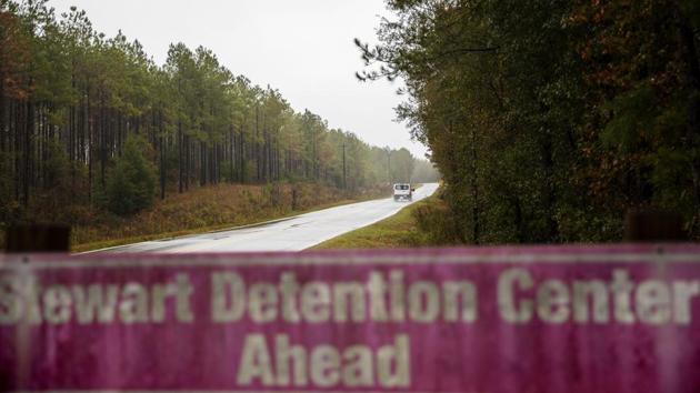 A detainee transport van travels the rural road back to the Stewart Detention Centre in Lumpkin. Campos fears her other son will meet the same fate after being detained when police were called on his friend. “I said, ‘Don’t tell me this,’” she told AP saying to the jail officer when she learned her son had been sent to Stewart. “I can’t think. I can’t talk. I can do nothing. My mind stays blank.” (David Goldman / AP)