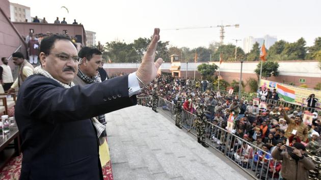 BJP working president JP Nadda waves at gathering during a program at party headquarters, in New Delhi, on Saturday. (Sonu Mehta/HT Photo) BJP working president JP Nadda waves at gathering during a program at party headquarters, in New Delhi, on Saturday. (Sonu Mehta/HT Photo)