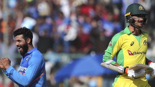 India's Ravindra Jadeja, left, celebrates the dismissal of Australia's Mitchell Starc(AP)