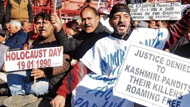Kashmiri Pandit migrants shout slogans against Jammu and Kashmir government during a protest in Jammu, on Sunday, January 19, 2020. Large sections of the 400,000-strong Pandit community were forced to leave Kashmir in January 1990 following terror attacks and a secessionist movement spearheaded by extremist groups.(Nitin Kanotra / HT Photo)