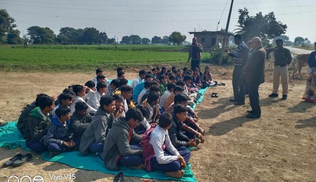 Students of a Government High School at Ratlam in Madhya Pradesh at a sit-in protest against the suspension of the principal. (HTPhoto) Students of a Government High School at Ratlam in Madhya Pradesh at a sit-in protest against the suspension of the principal. (HTPhoto)