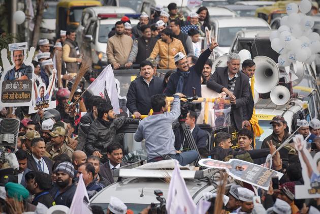 Delhi Chief Minister Arvind Kejriwal during a road show before filing his nomination for the upcoming assembly election, at Connaught Place, in New Delhi. (Sanchit Khanna/HT PHOTO) Delhi Chief Minister Arvind Kejriwal during a road show before filing his nomination for the upcoming assembly election, at Connaught Place, in New Delhi. (Sanchit Khanna/HT PHOTO)