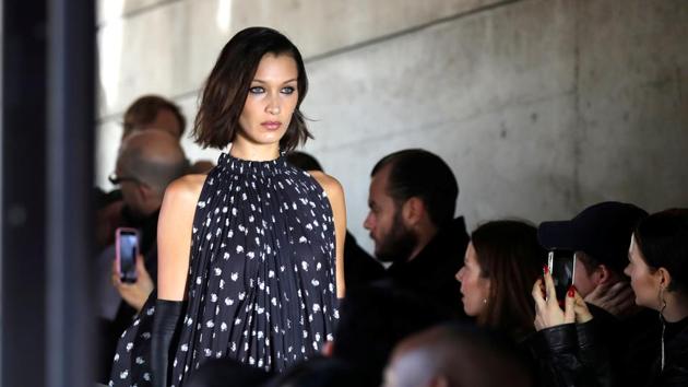 Model Bella Hadid presents a creation by designer Bruno Sialelli.  (REUTERS) 