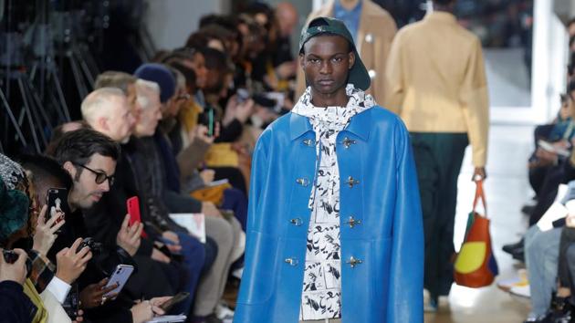 A model presents a creation by designer Bruno Sialelli as part of his Fall/Winter 2020/2021 collection show.  (REUTERS) 
