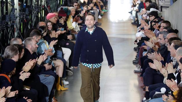 Designer Bruno Sialelli appears at the end of his Fall/Winter 2020/2021 collection show.  (REUTERS) 