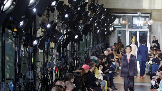 A model presents a creation by designer Bruno Sialelli as part of his Fall/Winter 2020/2021 collection. (REUTERS) 