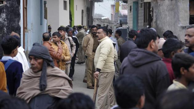 A team of police personnel was deployed in Sarfabad village, Noida, to ensure law and order after the death of a 20-year-old woman, in Noida, Monday, January 20, 2020.(Sunil Ghosh / HT Photo)