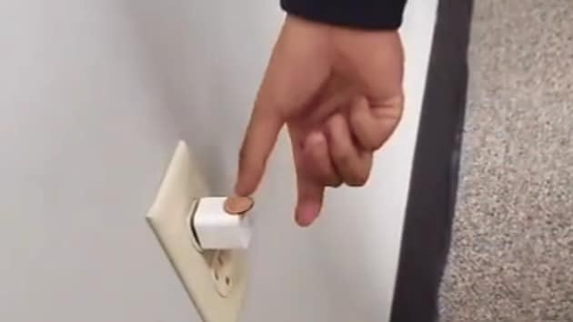 Authorities warned people not to try the electric socket and penny TikTok challenge.(TikTok/@ooofuss)
