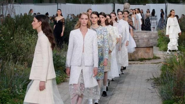 Models present creations by designer Virginie Viard as part of her Haute Couture Spring/Summer 2020 collection show for fashion house Chanel in Paris, France.(REUTERS) Models present creations by designer Virginie Viard as part of her Haute Couture Spring/Summer 2020 collection show for fashion house Chanel in Paris, France.(REUTERS)