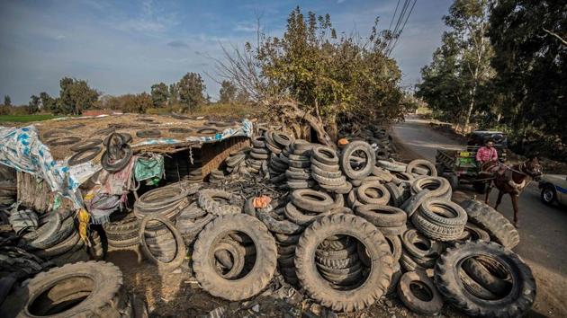 From early morning, workers covered in soot and dust can be seen sharpening their knives to cut huge tyres stockpiled on the village’s roadsides. “The entire village works on recycling damaged tyres,” 35-year-old Abdelwahab Mohamed told AFP, outside of his workshop. “We inherited it from our fathers and grandfathers.” (Khaled Desouki / AFP) From early morning, workers covered in soot and dust can be seen sharpening their knives to cut huge tyres stockpiled on the village’s roadsides. “The entire village works on recycling damaged tyres,” 35-year-old Abdelwahab Mohamed told AFP, outside of his workshop. “We inherited it from our fathers and grandfathers.” (Khaled Desouki / AFP)