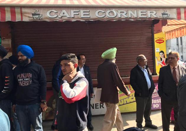 Members of SYFI and officials locking down a canteen on Punjabi University campus in Patiala on Wednesday. (HT PHOTO) Members of SYFI and officials locking down a canteen on Punjabi University campus in Patiala on Wednesday. (HT PHOTO)