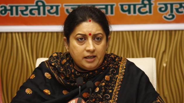 Besides Smriti Irani, the name and picture of Uttar Pradesh minister Suresh Pasi and outgoing district unit president of the BJP Durgesh Tripathi have also been used in the advertisement.(Yogendra Kumar/HT PHOTO)