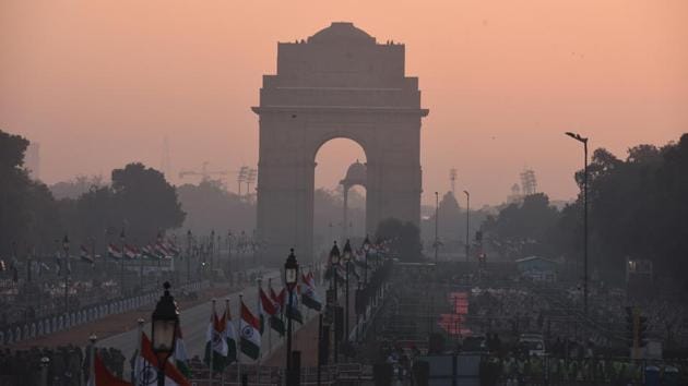 A view of India Gate around sunrise ahead of the full dress rehearsal of the Republic Day parade. Commuters in several parts of the national capital, especially central Delhi, woke to heavy traffic jams Thursday morning due to cordons for the full dress rehearsal of the parade. (Sonu Mehta / HT Photo) A view of India Gate around sunrise ahead of the full dress rehearsal of the Republic Day parade. Commuters in several parts of the national capital, especially central Delhi, woke to heavy traffic jams Thursday morning due to cordons for the full dress rehearsal of the parade. (Sonu Mehta / HT Photo)