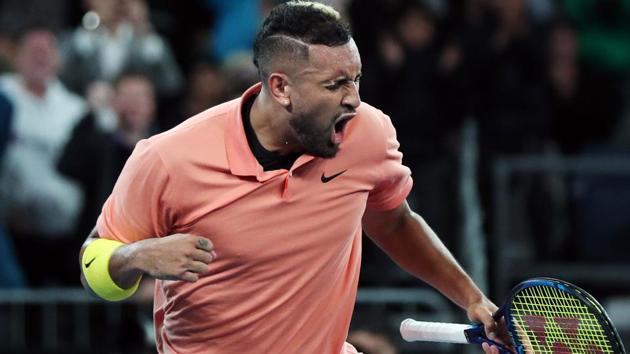 Australia's Nick Kyrgios celebrates winning the match against France's Gilles Simon.(REUTERS)