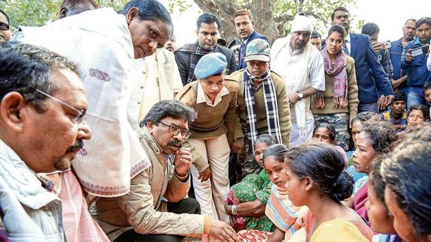 Chief minister Hemant Soren meets family members of those killed allegedly by Pathalgadi movement supporters, in West Shingbhum district of Jharkhand on Thursday.(PTI Photo)