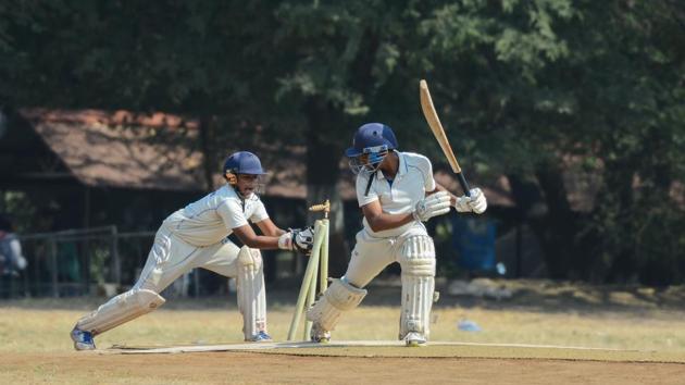 Symbiosis school batsman saves his wicket during the U-16 inter school cricket tournament final against Sardar Dastur school at Law College ground on Thursday. (MILIND SAURKAR/HT) Symbiosis school batsman saves his wicket during the U-16 inter school cricket tournament final against Sardar Dastur school at Law College ground on Thursday. (MILIND SAURKAR/HT)