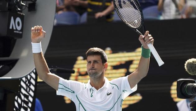 Serbia's Novak Djokovic celebrates after defeating Japan's Yoshihito Nishioka.(AP)