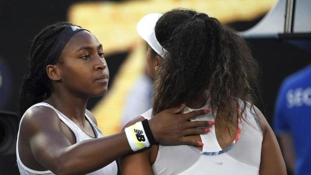 Coco Gauff, left, of the US is congratulated by Japan's Naomi Osaka.(AP)